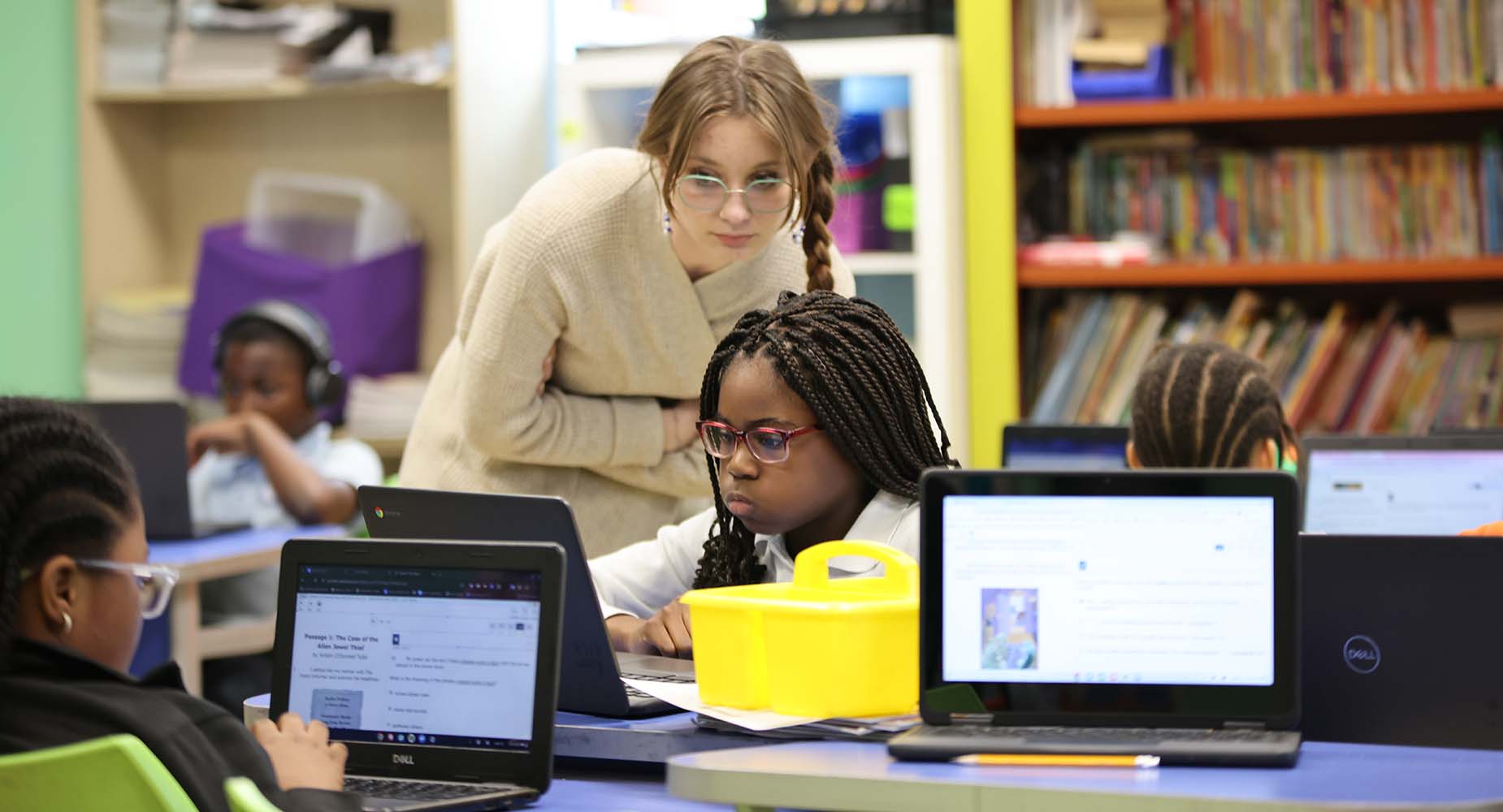 IMSA student waving at camera